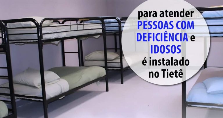 foto com um dos quartos do centro. Quatro beliches ao redor. Sobre a foto, o texto: Centro de Acolhida Emergencial para atender pessoas com deficiência e idosos é instalado no Tietê. No rodapé, as hashtags: #FiqueEmCasa #TodosPorTodos e as logomarcas das redes sociais com os endereços da SMPED: facebook: smpedsp; twitter: smpedsp; youtube: inclusaosp e instagram: smpedsp. Logotipo com o brasão Cidade de São Paulo Pessoa com Deficiência.